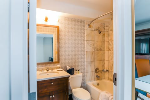 Room, 2 Queen Beds | Bathroom | Combined shower/tub, designer toiletries, hair dryer, bathrobes