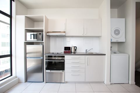 Apartment, 1 Bedroom | Private kitchen | Fridge, microwave, stovetop, dishwasher