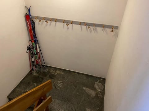 The ski storage area in the stairwell