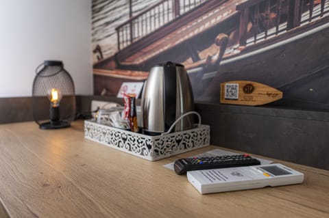 Deluxe Triple Room | Premium bedding, minibar, desk, laptop workspace