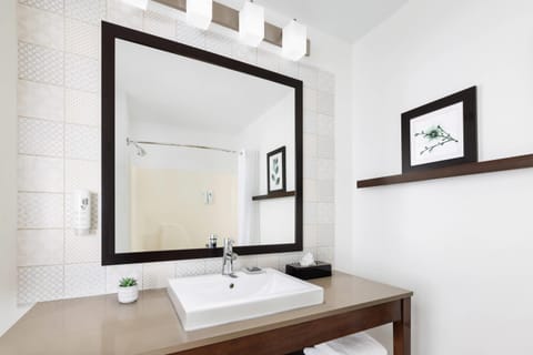 Blackout drapes, iron/ironing board, free cribs/infant beds