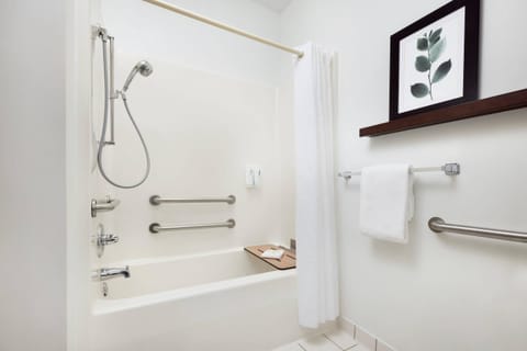 Blackout drapes, iron/ironing board, free cribs/infant beds