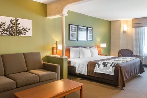 Suite, 1 King Bed, Jetted Tub | In-room safe, iron/ironing board, travel crib, rollaway beds
