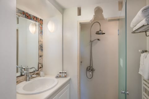 Suite, Sea View | Bathroom | Shower, free toiletries, hair dryer, bathrobes