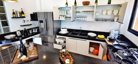 Luxury Villa | Private kitchen | Fridge, microwave, stovetop, electric kettle