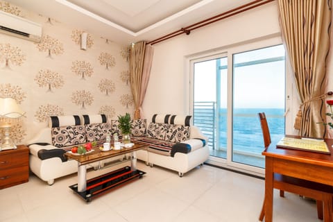 Romeliess Deluxe Room, Sea View | Living area | 32-inch LCD TV with satellite channels, TV