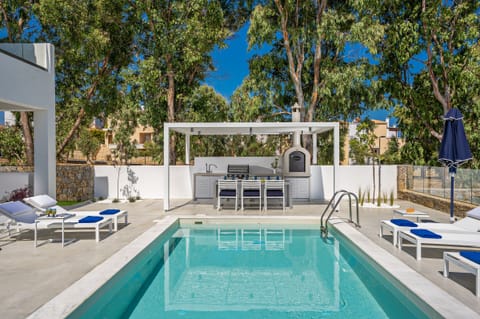 Sophisticated pool surroundings offering a sense of tranquility.