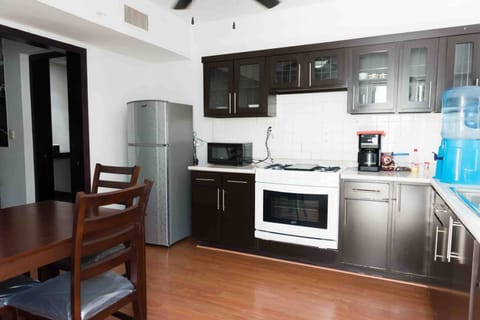 Apartment, 1 Bedroom, Smoking, Patio | Private kitchen | Stovetop, coffee/tea maker, cookware/dishes/utensils