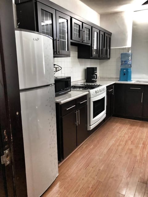 Apartment, 1 Bedroom, Smoking, Patio | Private kitchen | Stovetop, coffee/tea maker, cookware/dishes/utensils