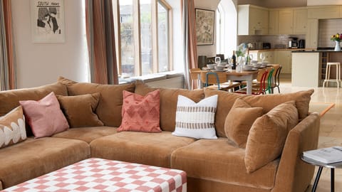 The inviting seating area makes it ideal for gathering with loved ones.