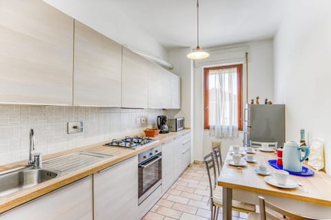 Family Apartment, 1 Bedroom (Casa Arno 500m from beach) | Private kitchen | Full-size fridge, microwave, oven, stovetop