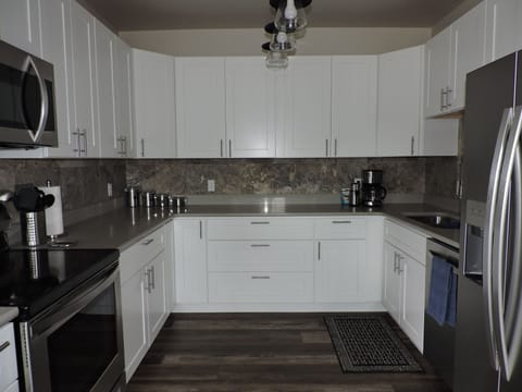 My husband installed the beautiful rock backsplash in the kitchen.