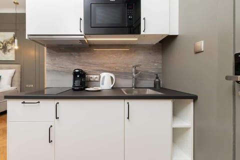 The kitchenette's practical layout maximizes space and functionality.