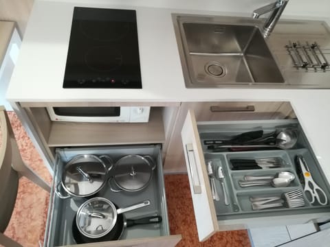 Fridge, microwave, stovetop, highchair