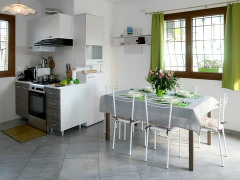 Furniture, Room, Property, Floor, Interior Design, Kitchen, Green, Building, Table, Tile