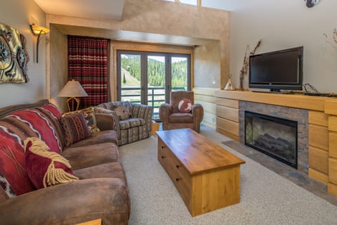 Cozy up by the fire and enjoy a movie | Main Level
