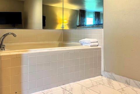 Studio Suite, 1 King Bed, Non Smoking | Desk, laptop workspace, blackout drapes, iron/ironing board