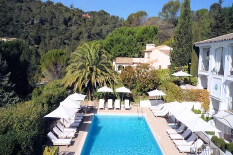 Outdoor pool, open 8:00 AM to 9:00 PM, pool umbrellas, sun loungers