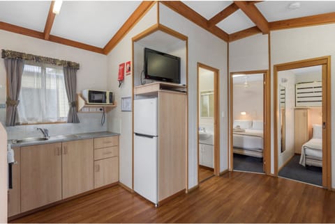 Standard 2 Bedroom Cabin | Private kitchen | Full-size fridge, microwave, stovetop, toaster