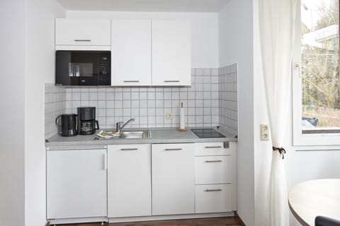 Fridge, microwave, dishwasher, coffee/tea maker