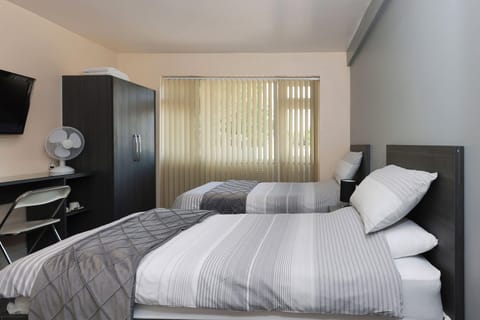 Standard Twin Room, 2 Twin Beds, Shared Bathroom | Desk, free WiFi, bed sheets