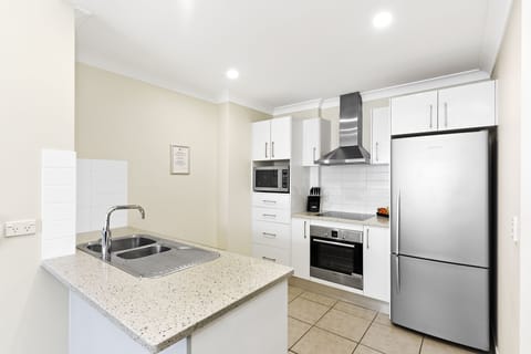 Apartment, 1 Bedroom | Private kitchen | Coffee/tea maker, electric kettle, highchair