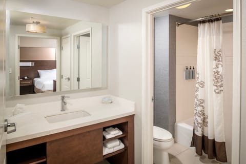 Suite, 1 Bedroom, Non Smoking | Bathroom | Hair dryer, towels, soap, shampoo