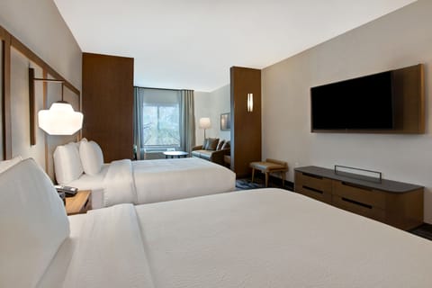 Suite, Multiple Beds, Non Smoking | Down comforters, desk, laptop workspace, blackout drapes