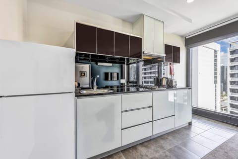 One Bedroom Apartment | Private kitchenette | Fridge, microwave, stovetop, coffee/tea maker