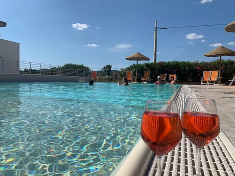 Seasonal outdoor pool, pool umbrellas, sun loungers