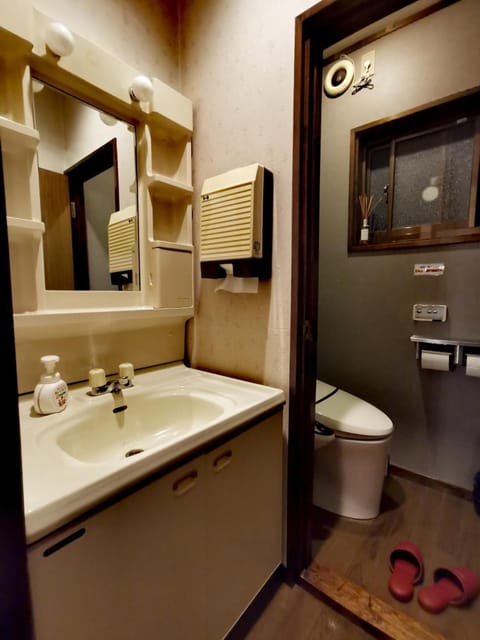 Triple Room with Private Toilet | Bathroom | Hair dryer, slippers, towels