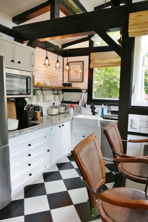 Full bright and cheery kitchen.