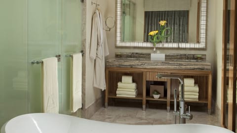 Signature Room (Mulia Signature) | Bathroom | Separate tub and shower, deep soaking tub, rainfall showerhead