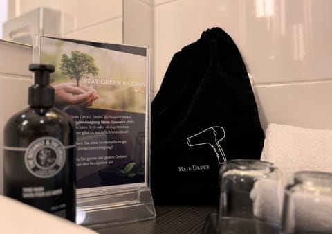 Economy Double Room | Bathroom | Shower, free toiletries, hair dryer, slippers