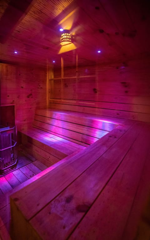 Sauna, spa tub, hot stone massages, deep-tissue massages