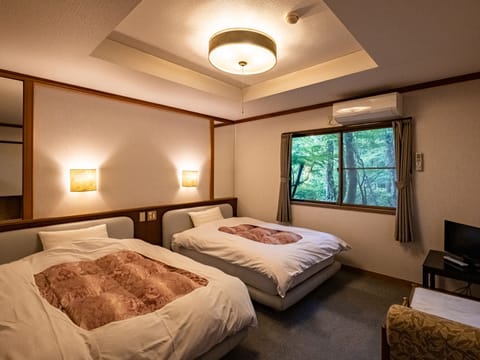 Twin Room, 2 Twin Beds | In-room safe, free WiFi, bed sheets