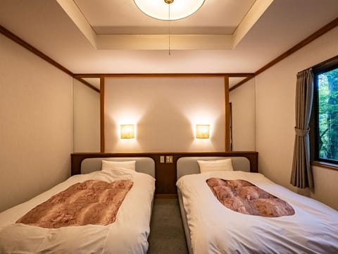 Twin Room, 2 Twin Beds | In-room safe, free WiFi, bed sheets