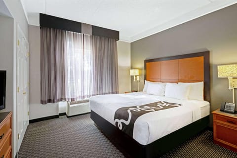 Suite, 1 King Bed, Non Smoking | Pillowtop beds, desk, blackout drapes, iron/ironing board