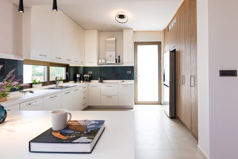 Fully equipped kitchen on the ground floor.