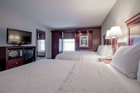 Standard Room, 2 Queen Beds, Walk-In Shower | In-room safe, desk, laptop workspace, blackout drapes