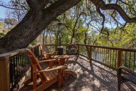 Enjoy wine or cofee on our tree top deck