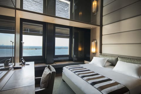 Family Suite, 2 Bedrooms, Sea View | Premium bedding, minibar, in-room safe, individually decorated