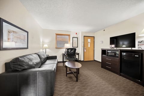 Premier Suite, 1 Bedroom, Non Smoking | Desk, laptop workspace, blackout drapes, iron/ironing board