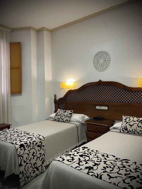 Economy Double or Twin Room | In-room safe, free WiFi, bed sheets