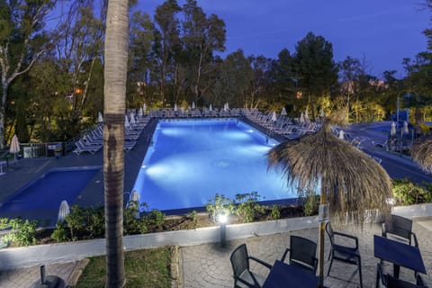 2 outdoor pools, pool umbrellas, sun loungers