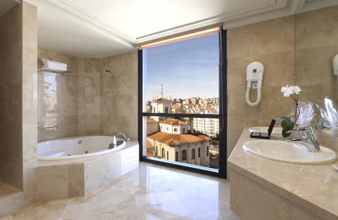 Junior Suite, Sea View | Bathroom | Combined shower/tub, deep soaking tub, hair dryer, bidet