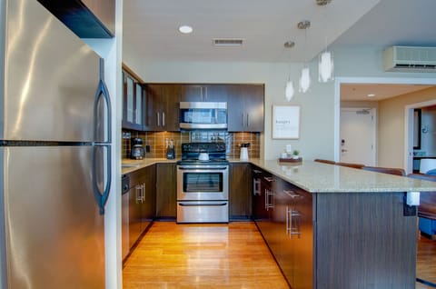 1 Bedroom, 1.5 Bathroom Loft Apartment | Private kitchen | Fridge, microwave, oven, stovetop