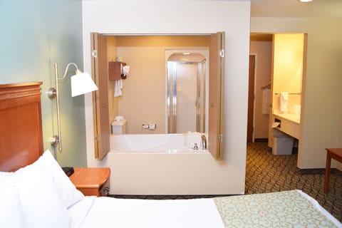 Standard Room, 1 King Bed, Jetted Tub (No Lake View) | Bathroom | Hair dryer, towels