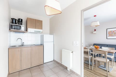 Apartment | Private kitchen | Fridge, microwave, stovetop, dishwasher