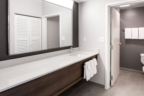 Suite, 1 Bedroom, Non Smoking | Bathroom | Hair dryer, towels, soap, shampoo